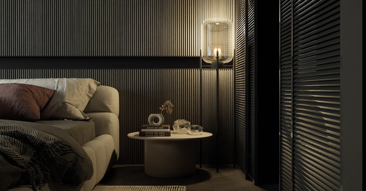 Intérieur de chambre élégant avec un design moderne, un éclairage ambiant et des murs texturés.